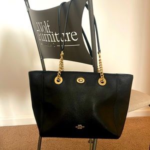 Coach women’s  pebbled turn lock chain leathered tote purse black in color